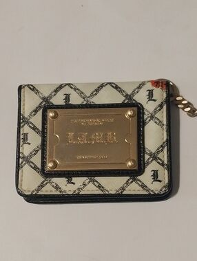 L.A.M.B Marigold Wristlet EUC